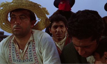 Movie still from “Django” (1966), directed by Sergio Corbucci – A group of men in traditional mexican clothing; Close Up shot, Low angle