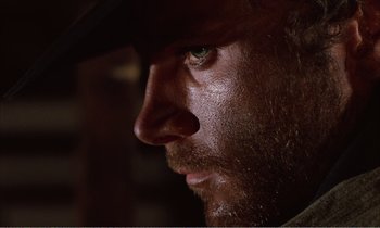 Movie still from “Django” (1966), directed by Sergio Corbucci – A man's face with a hat on; Close Up shot, Low angle