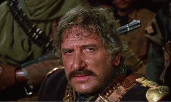 Movie still from “Django” (1966), directed by Sergio Corbucci – An older man with a mustache and a beard; Close Up shot, Low angle