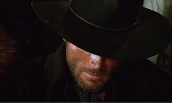 Movie still from “Django” (1966), directed by Sergio Corbucci – A person wearing a hat; Close Up shot, Low angle