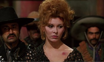 Movie still from “Django” (1966), directed by Sergio Corbucci – A person wearing a black dress; Close Up shot, Low angle
