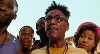 Movie still from “Do the Right Thing” (1989), directed by Spike Lee – A group of men standing next to each other; Close Up shot, Low angle