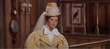 Movie still from “Doctor Dolittle” (1967), directed by Richard Fleischer – A person wearing a hat with a veil; Close Up shot, Low angle
