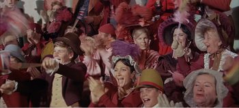 Movie still from “Doctor Dolittle” (1967), directed by Richard Fleischer – A group of people wearing fancy hats in a crowd; Medium shot, High angle