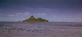 Movie still from “Doctor Dolittle” (1967), directed by Richard Fleischer – An island in the middle of the ocean; Extreme Wide shot, High angle