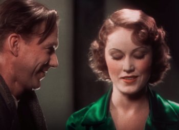 Movie still from “Doctor X” (1932), directed by Michael Curtiz – A man and a woman talking to each other; Close Up shot, Over the shoulder angle