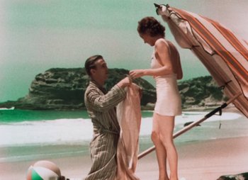 Movie still from “Doctor X” (1932), directed by Michael Curtiz – A man and a woman in bathing suits on the beach; Wide shot, High angle