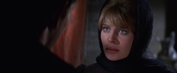 Movie still from “Doctor Zhivago” (1965), directed by David Lean – A person wearing a hooded jacket; Close Up shot, Over the shoulder angle