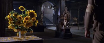 Movie still from “Doctor Zhivago” (1965), directed by David Lean – A room filled with statues and flowers in it; Wide shot, High angle