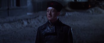 Movie still from “Doctor Zhivago” (1965), directed by David Lean – A man in a leather jacket and a hat; Close Up shot, Low angle