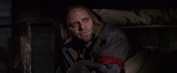 Movie still from “Doctor Zhivago” (1965), directed by David Lean – A man with long blonde hair and blue eyes; Close Up shot, Low angle