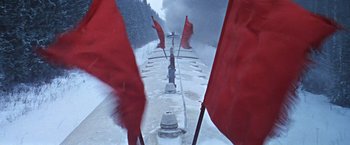 Movie still from “Doctor Zhivago” (1965), directed by David Lean – A view of a fire hydrant from a train window; Wide shot, Low angle