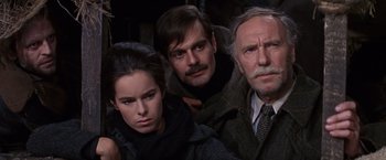 Movie still from “Doctor Zhivago” (1965), directed by David Lean – A group of people standing next to each other in a room; Close Up shot, High angle