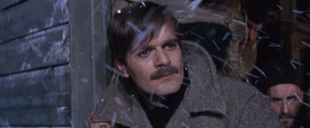 Movie still from “Doctor Zhivago” (1965), directed by David Lean – A person wearing a coat; Close Up shot, Low angle