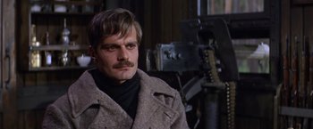 Movie still from “Doctor Zhivago” (1965), directed by David Lean – A person with a mustache wearing a coat; Close Up shot, Over the shoulder angle