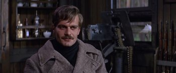 Movie still from “Doctor Zhivago” (1965), directed by David Lean – A person with a mustache wearing a coat; Close Up shot, Over the shoulder angle