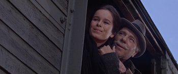 Movie still from “Doctor Zhivago” (1965), directed by David Lean – A man and a woman standing next to each other; Close Up shot, Low angle