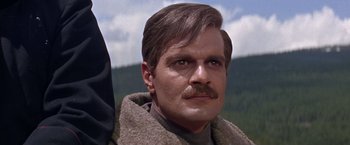 Movie still from “Doctor Zhivago” (1965), directed by David Lean – A person with a mustache wearing a coat; Close Up shot, Low angle