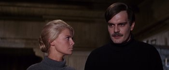 Movie still from “Doctor Zhivago” (1965), directed by David Lean – A man and a woman standing next to each other; Close Up shot, Low angle