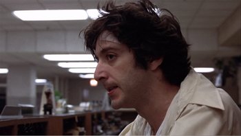 Movie still from “Dog Day Afternoon” (1975), directed by Sidney Lumet – A person wearing a white shirt; Close Up shot, Low angle