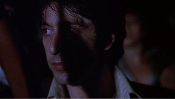 Movie still from “Dog Day Afternoon” (1975), directed by Sidney Lumet – A person's face in the dark; Close Up shot, Low angle