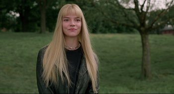 Movie still from “The New Mutants” (2020), directed by Josh Boone – A woman with long blonde hair wearing a leather jacket; Close Up shot, Low angle