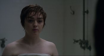 Movie still from “The New Mutants” (2020), directed by Josh Boone – A woman with wet hair and a towel around her neck; Close Up shot, Over the shoulder angle