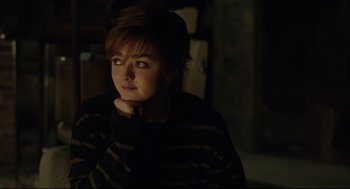 Movie still from “The New Mutants” (2020), directed by Josh Boone – A woman sitting in a dark room with her hand on her chin; Close Up shot, Over the shoulder angle