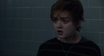 Movie still from “The New Mutants” (2020), directed by Josh Boone – A young man with a scar on his face; Close Up shot, Over the shoulder angle