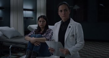 Movie still from “The New Mutants” (2020), directed by Josh Boone – Two women are standing in front of each other; Medium shot, Low angle