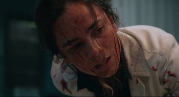 Movie still from “The New Mutants” (2020), directed by Josh Boone – A woman with blood all over her face and neck; Close Up shot, Low angle