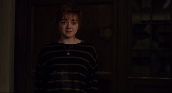 Movie still from “The New Mutants” (2020), directed by Josh Boone – A woman with short hair wearing a striped shirt; Medium shot, Over the shoulder angle