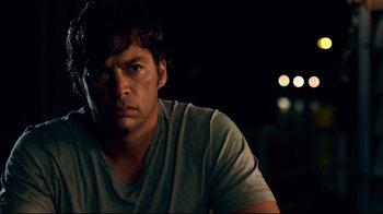 Movie still from “Dolphin Tale” (2011), directed by Charles Martin Smith – A person wearing a white shirt; Close Up shot, Over the shoulder angle