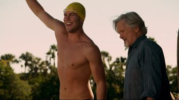 Movie still from “Dolphin Tale” (2011), directed by Charles Martin Smith – A young man and an older man standing next to each other; Medium shot, Over the shoulder angle