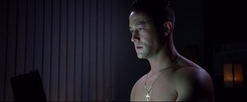 Movie still from “Don Jon” (2013), directed by Joseph Gordon-Levitt – A person wearing a necklace; Close Up shot, Low angle