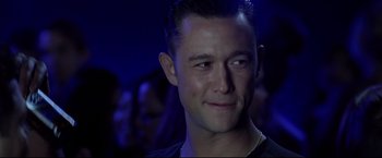Movie still from “Don Jon” (2013), directed by Joseph Gordon-Levitt – A man's face in a dark room; Close Up shot, Over the shoulder angle