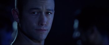 Movie still from “Don Jon” (2013), directed by Joseph Gordon-Levitt – A man's face in the dark; Close Up shot, Over the shoulder angle