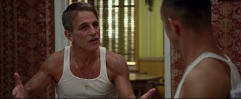 Movie still from “Don Jon” (2013), directed by Joseph Gordon-Levitt – A man talking to someone in the mirror; Medium shot, Over the shoulder angle