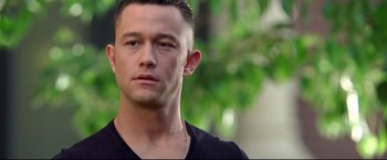 Movie still from “Don Jon” (2013), directed by Joseph Gordon-Levitt – A person wearing a black t - shirt; Close Up shot, Over the shoulder angle