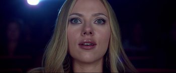 Movie still from “Don Jon” (2013), directed by Joseph Gordon-Levitt – A woman's face with green eyes; Close Up shot, Low angle