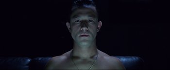 Movie still from “Don Jon” (2013), directed by Joseph Gordon-Levitt – A person wearing a necklace; Close Up shot, Overhead angle