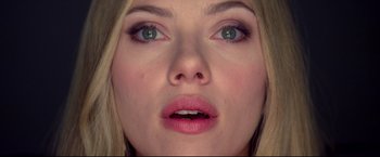 Movie still from “Don Jon” (2013), directed by Joseph Gordon-Levitt – A woman's eyes and lips; Extreme Close Up shot, Overhead angle