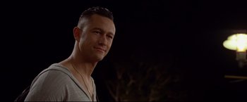Movie still from “Don Jon” (2013), directed by Joseph Gordon-Levitt – A person with short hair; Close Up shot, Over the shoulder angle