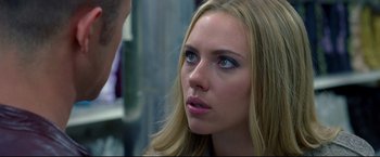 Movie still from “Don Jon” (2013), directed by Joseph Gordon-Levitt – A person with long blonde hair; Close Up shot, Over the shoulder angle