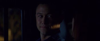 Movie still from “Don Jon” (2013), directed by Joseph Gordon-Levitt – A person's face in the dark; Close Up shot, Over the shoulder angle