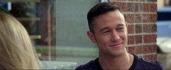 Movie still from “Don Jon” (2013), directed by Joseph Gordon-Levitt – A person sitting in front of a window; Close Up shot, Over the shoulder angle