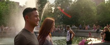 Movie still from “Don Jon” (2013), directed by Joseph Gordon-Levitt – A man and a woman standing in front of a fountain; Medium shot, Over the shoulder angle
