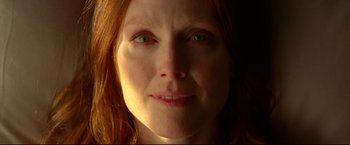 Movie still from “Don Jon” (2013), directed by Joseph Gordon-Levitt – A woman's face in the sunlight; Close Up shot, Overhead angle