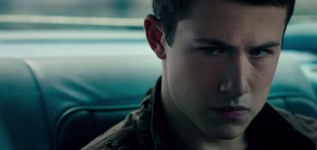 Movie still from “Don't Breathe” (2016), directed by Fede Alvarez – A young man's face in a car; Close Up shot, High angle