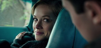 Movie still from “Don't Breathe” (2016), directed by Fede Alvarez – A person sitting in a car; Close Up shot, Over the shoulder angle